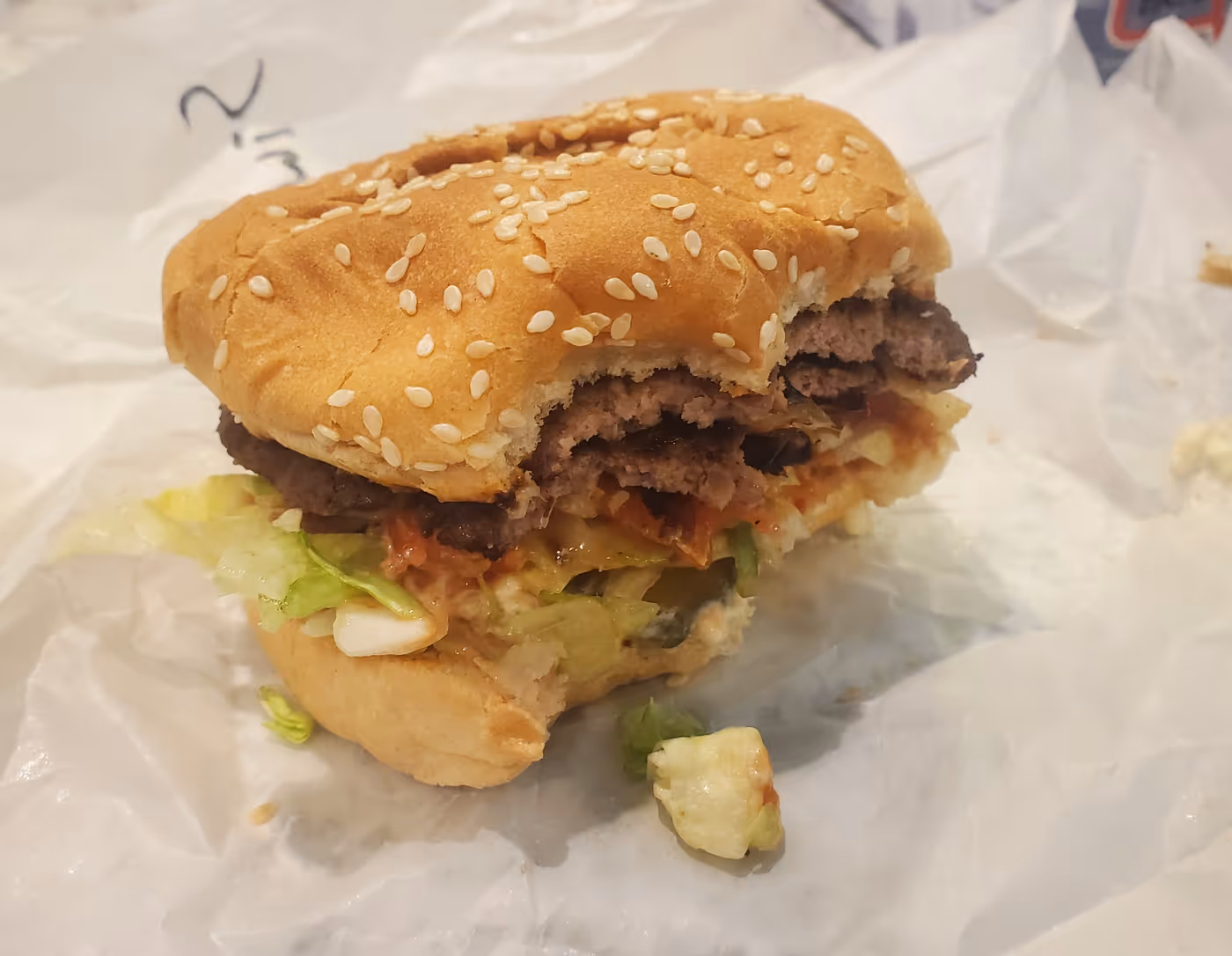 a half-eaten burger from Fritz's