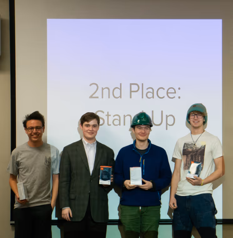me and my team members accepting our second place prize at the closing ceremonies